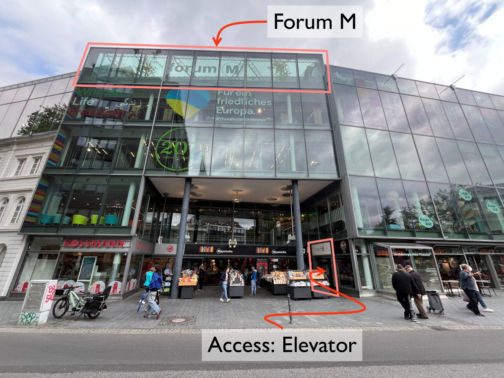 Entrance and elevator to Forum M outside "Mayersche"