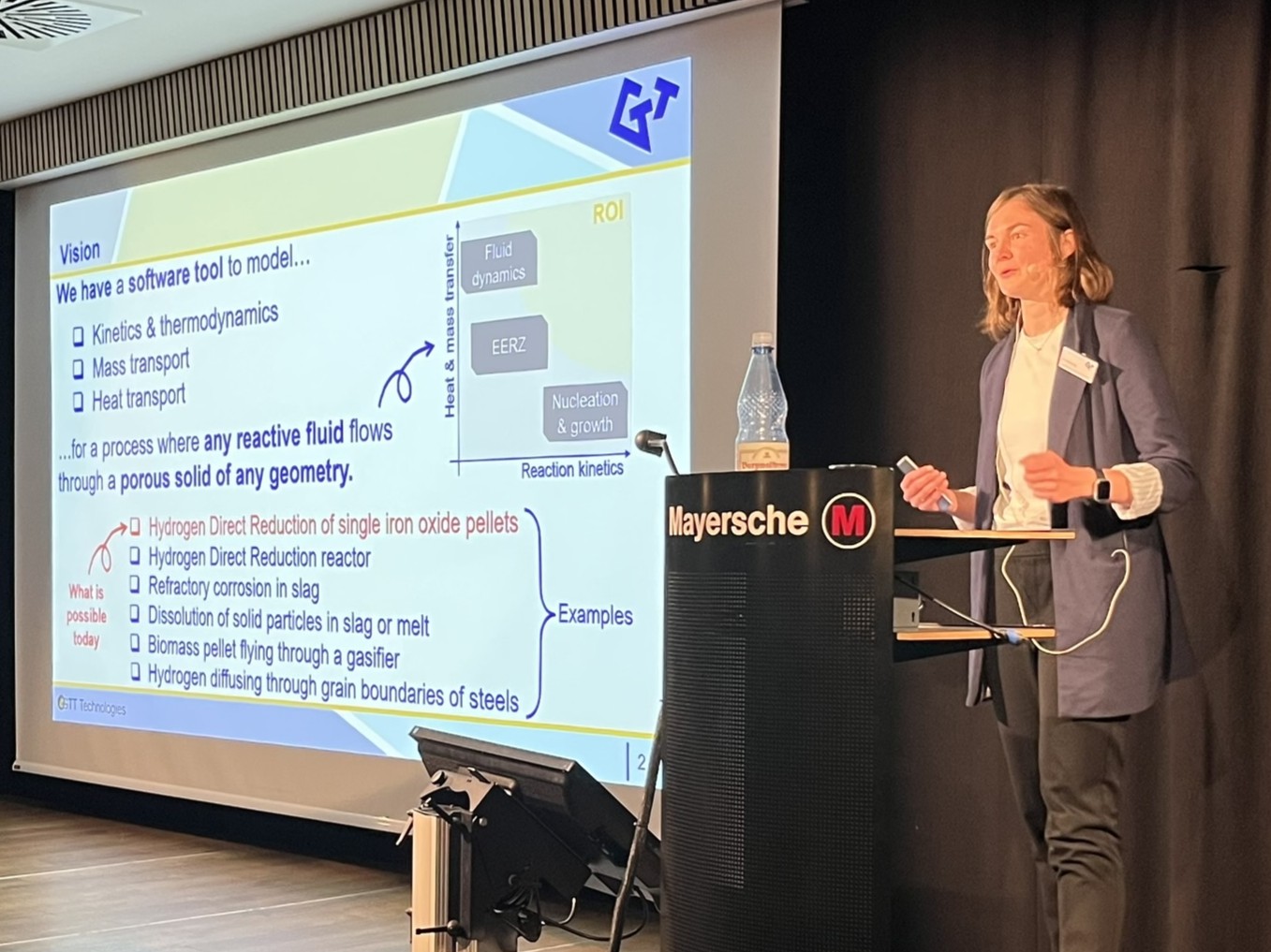 Speaker presenting a technical talk at the Users’ Meeting